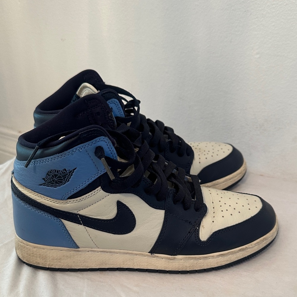 Nike High-Top Sneakers in Black, Cream, and Blue